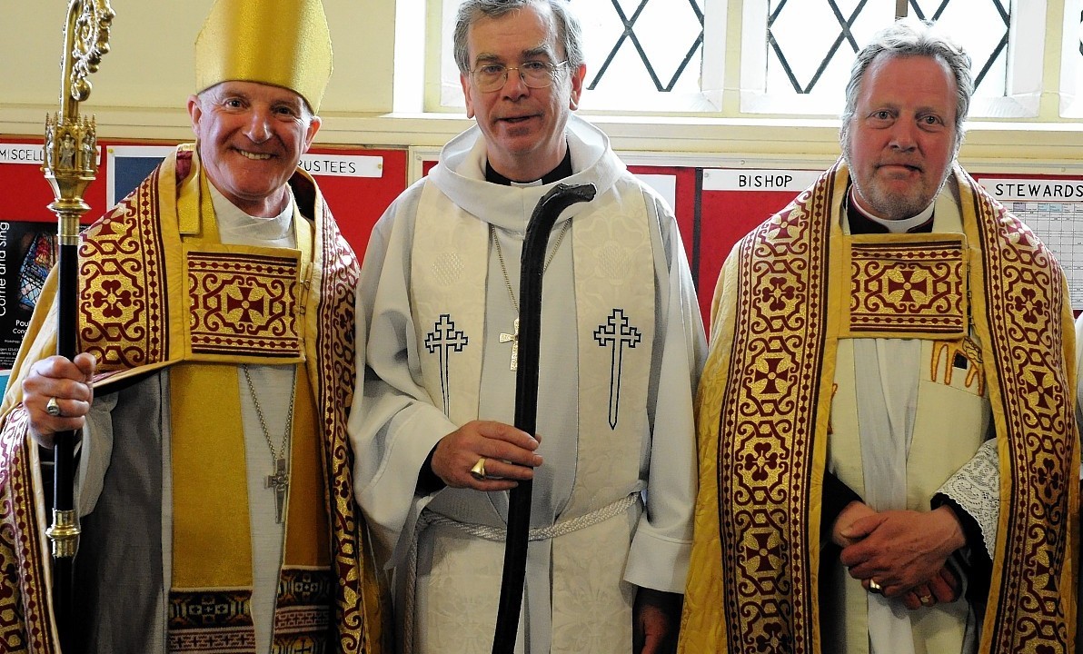 The Rt Rev Dr Robert Gillies: Niall Co-arb of St Moluag, with the great staff of Saint Moluag, the Bachuil Mor and The Dean The very Rev Dr Emsley Nimmo from Pilgrimage.