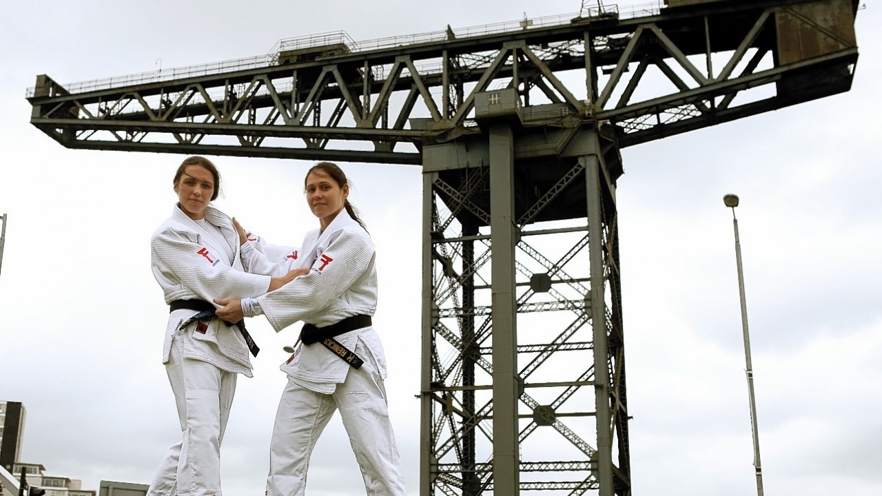 Scotland's Judo Athletes sisters (left) Kimberley and Louise Renicks beside the Finnieston Crane as they are announced as part of Team Scotlland for the Commonwealth Games during the photocall at The Hydro, Glasgow.