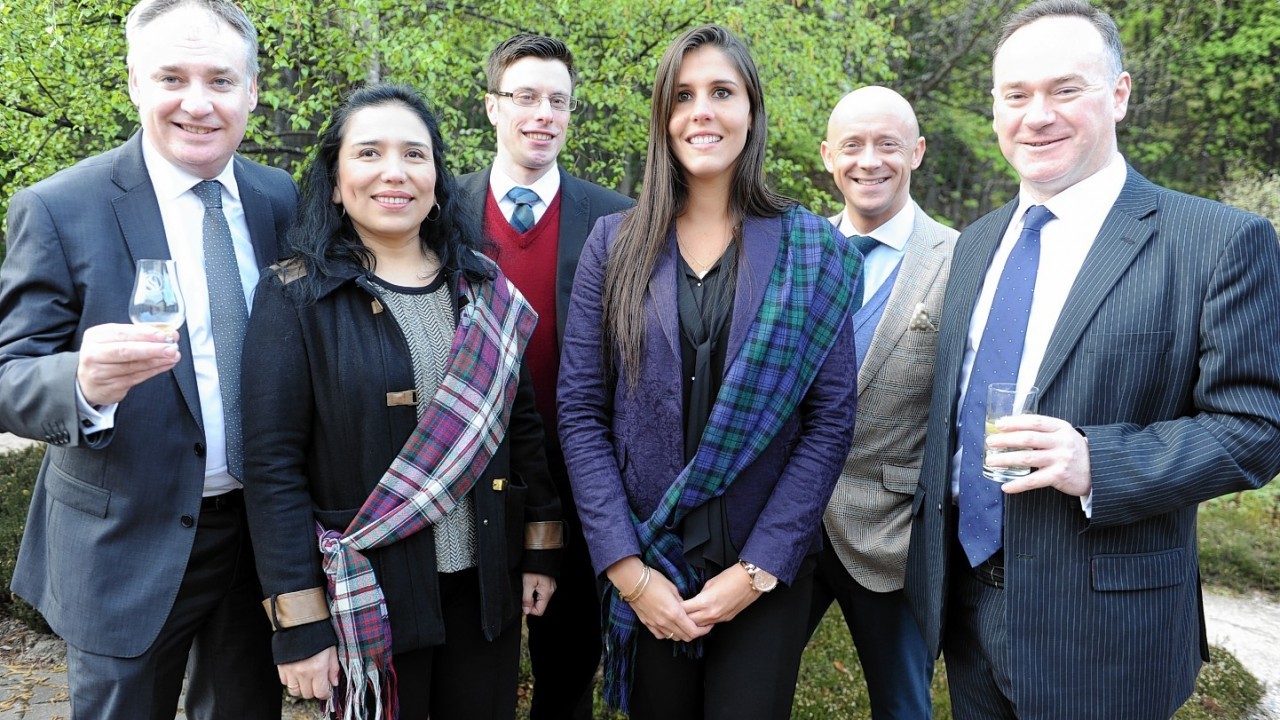 The opening of the Speyside Whisky Festival at Glen Grant Distillery, Rothes. L-R: MSP Richard Lochhead, Rosa-Maria Goboy, Craig Ware, Maria-Jose Cabrera, George McNeil, and Giles Hamilton.