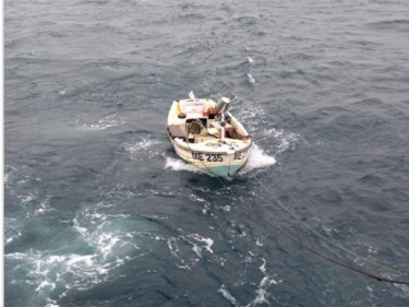 A picture of the missing boat posted by a crew members of the Sylvia Bowers as it is towed into port 