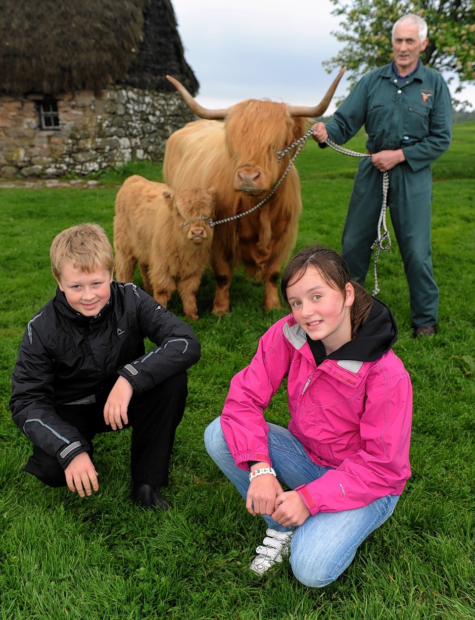 'Beyond the Battlefield' conservation activities preview.  Pictured from left,  Alexander Thom,  Alexander Webster and Iona Pettigrew, all 10 and from Glenurquhart Primary School, Colin Paterson, farmer with Julie and Eva and Richard Ridgwell