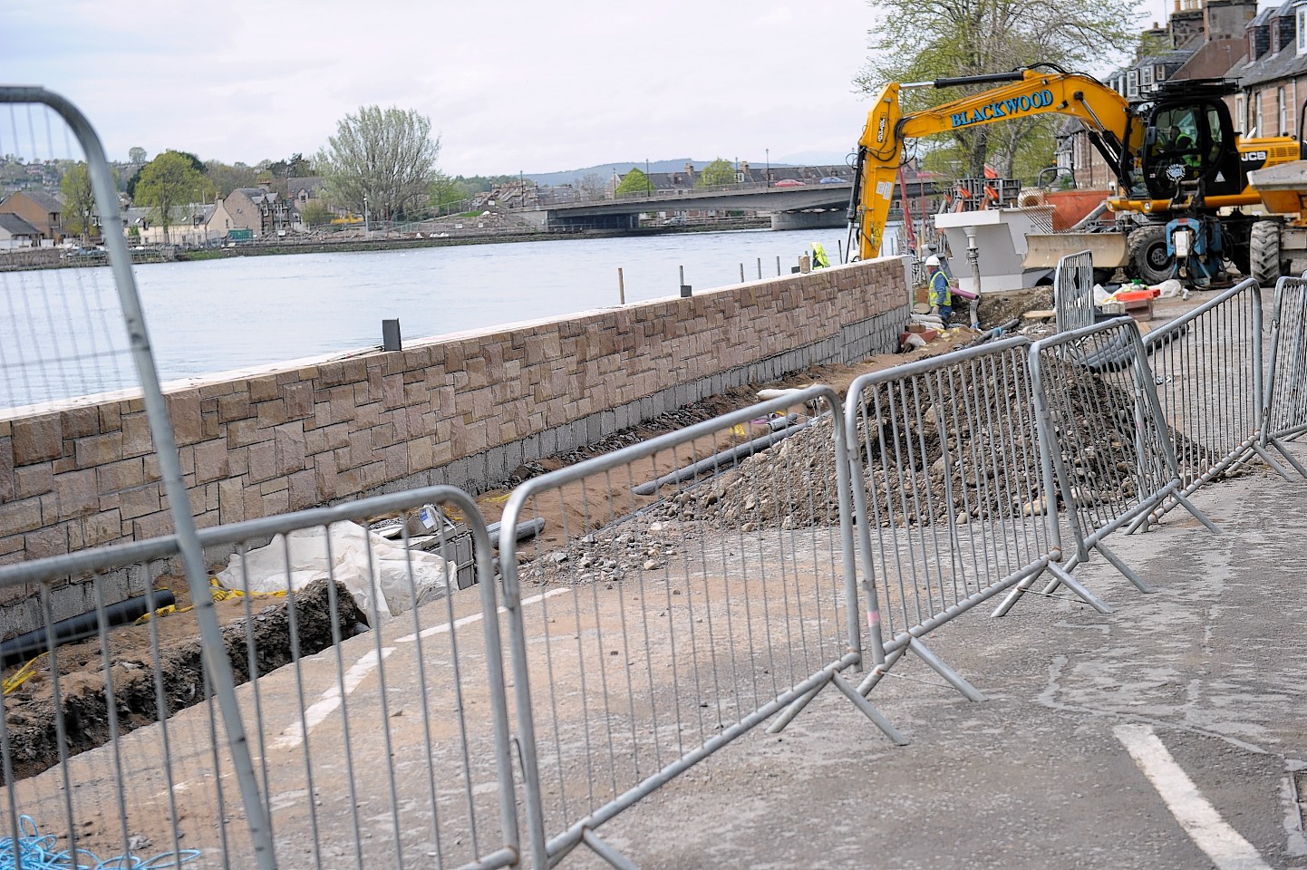 Work on the Inverness flood scheme was late and over budget.