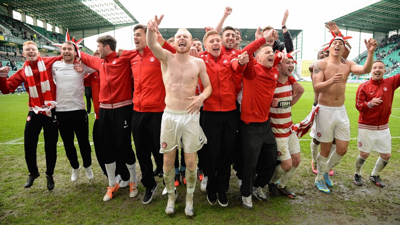 The Hamilton players celebrate promotion to the Scottish Premiership.