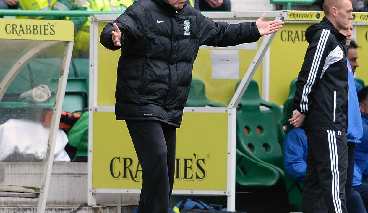 Hibernian manager Terry Butcher issues instructions from the touchline.