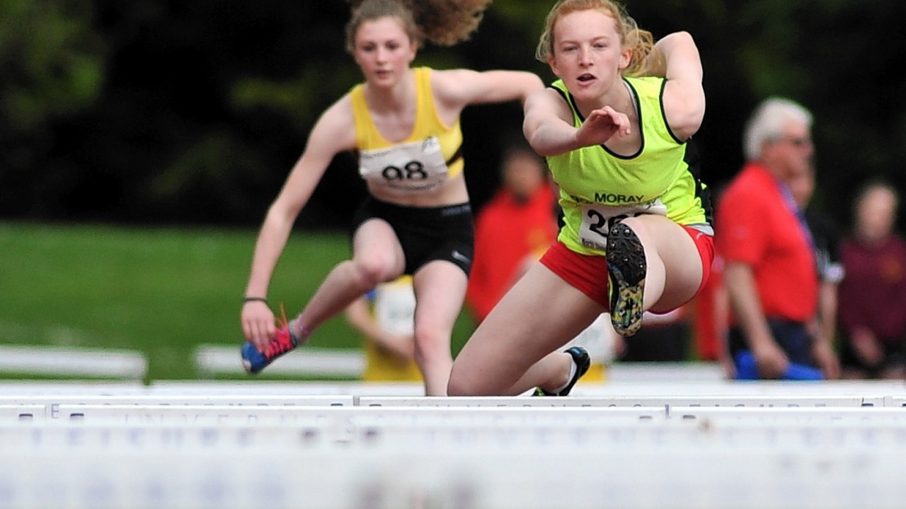 North District Athletic Championships at Queens Park Stadium, Inverness. Lauren Bell, Moray Road Runners, competing in the hurdles.