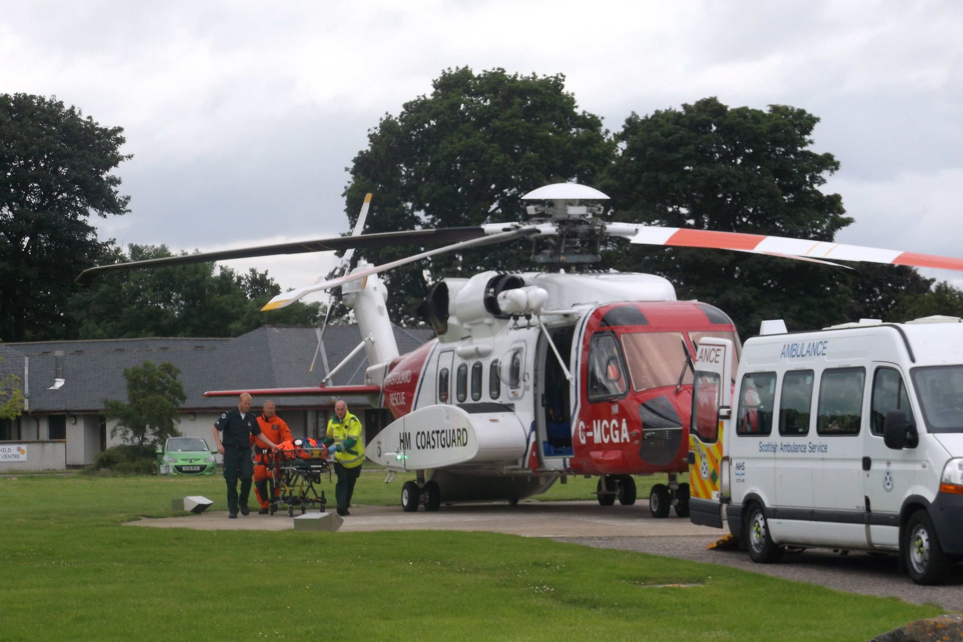 A victim from the crash at Achnasheen is taken from the air ambulance