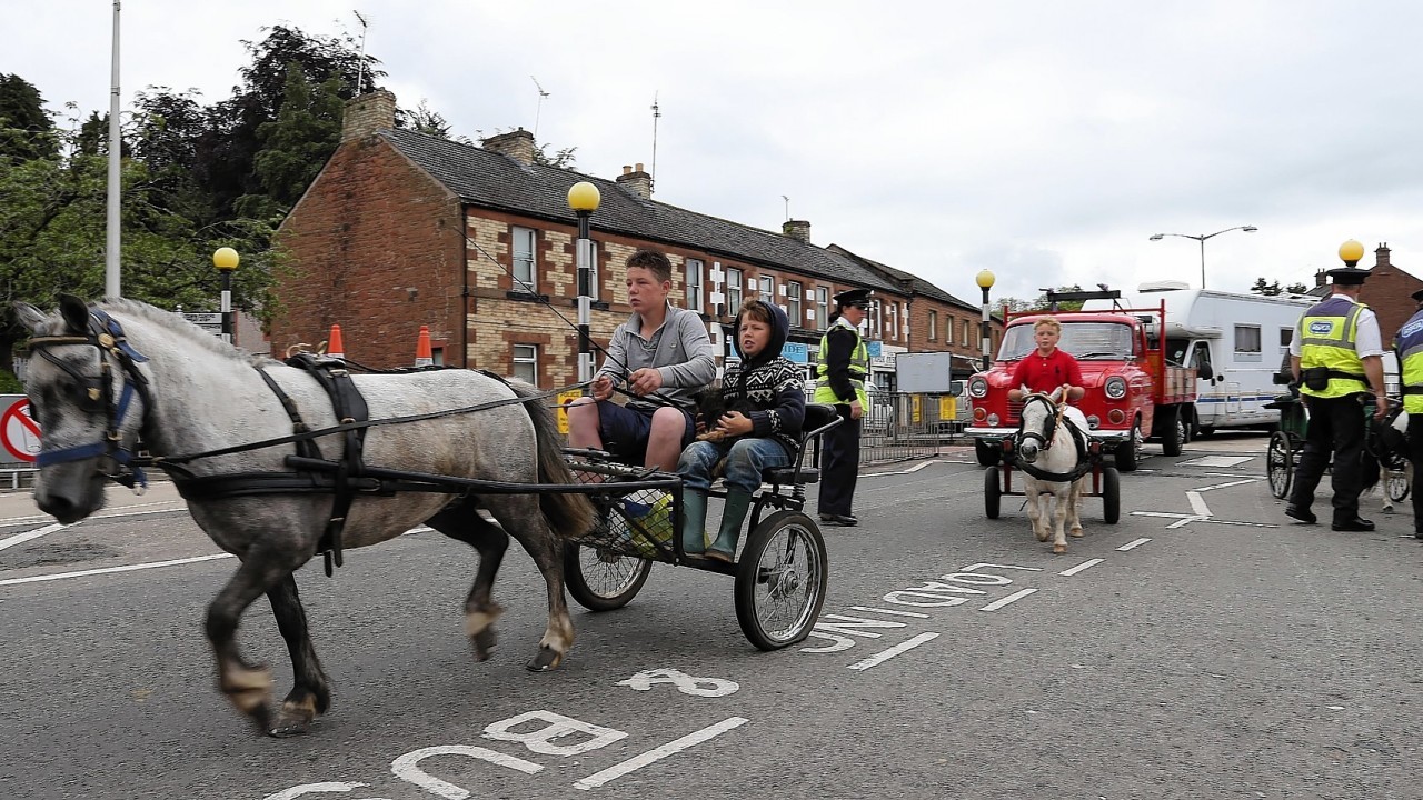 People arrive for the start of the Appleby Horse Fair, the annual gathering of gypsies and travellers in Appleby, Cumbria.