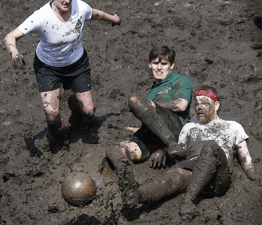 Players got knee-deep in mud on a purpose-built peat football field today in an event organised whisky maker Ardbeg
