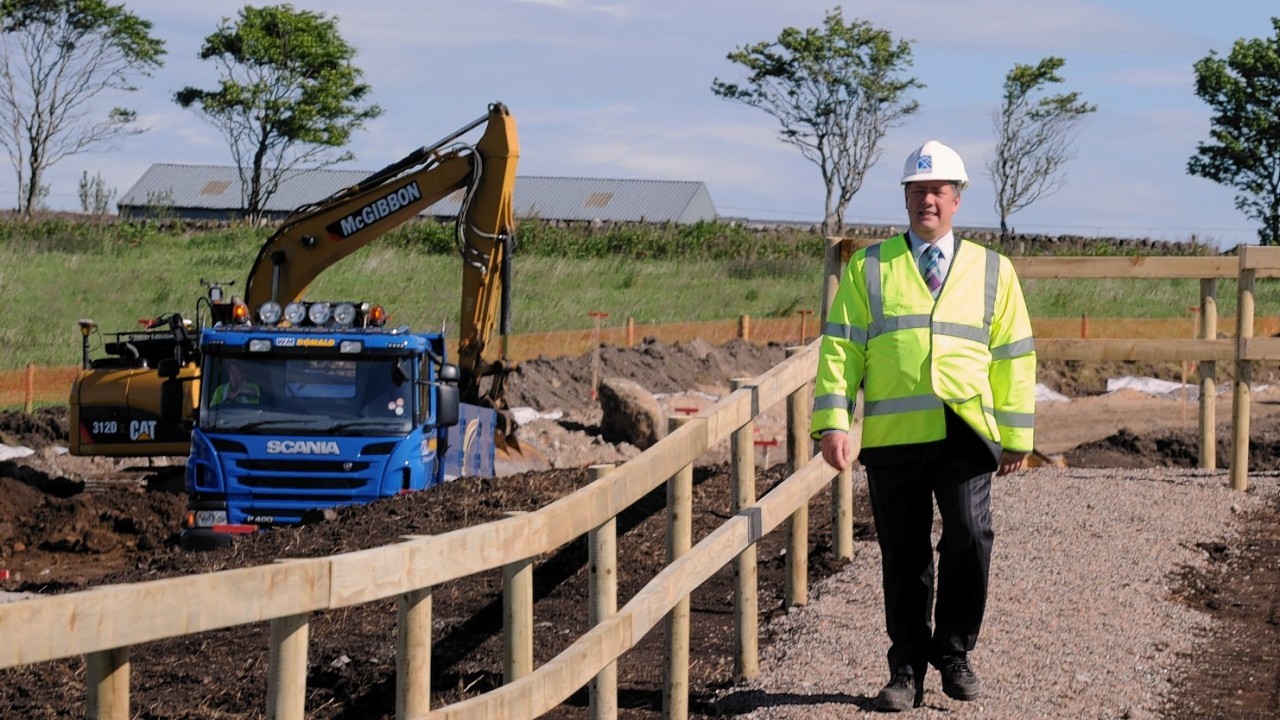 The annoncement of the prefeered bidder for the Aberdeen western peripheral route. In the picture at near Findon is Transport minister, Keith Brown.