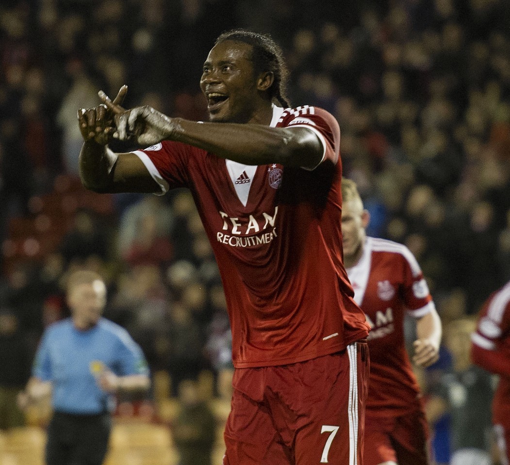 Calvin Zola celebrates scoring for Aberdeen