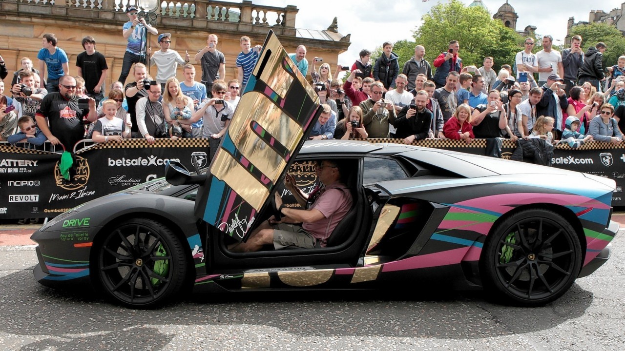 Hundreds of people turned out to watch dozens of supercars set off from The Mound in Edinburgh and head to London on the next stage of the Gumball 3000.