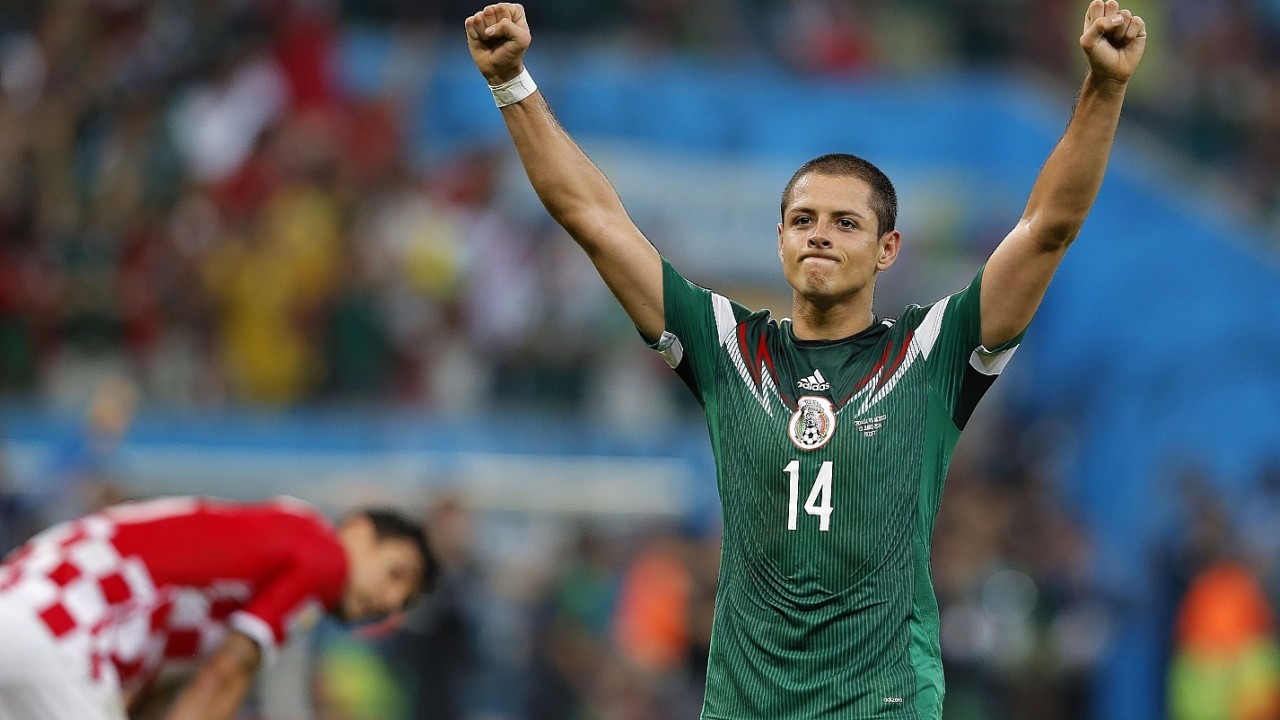 Mexico's Javier Hernandez celebrates at the end of  the group A World Cup soccer match between Croatia and Mexico at the Arena Pernambuco in Recife