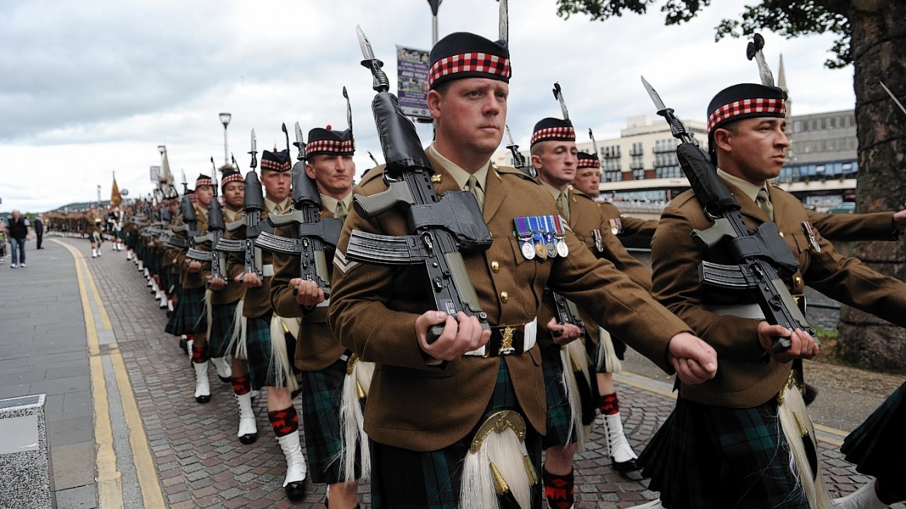Armed Forces Day Parade in Inverness. 
4SCOTS The Highlanders march to the Northern Meeting Park for the drumhead service.