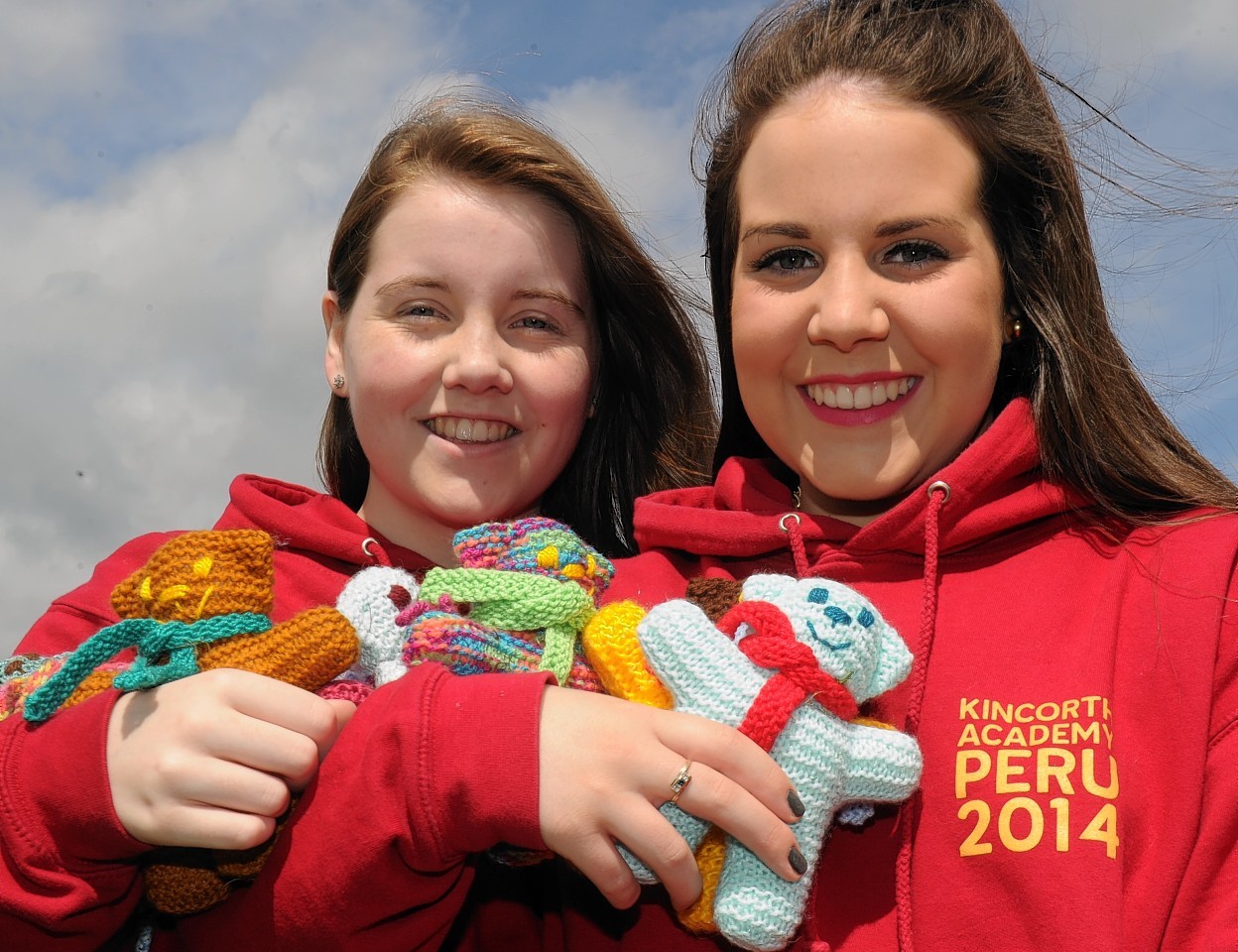 Kincorth Academy Aberdeen - pupils from the school are going to Peru to help orphans. One of the pupils grandmother has knitted over 60 teddies which they will take. (from left) Ailsa Ross, 17 (whose grandmother knitted over 60 teddies to take with them) and Aimee Gray, 16.