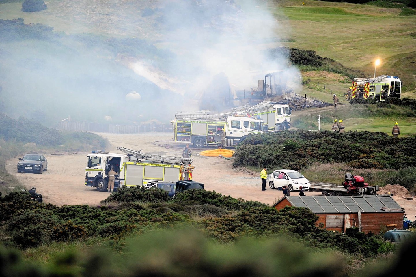 Firefighters tackle the blaze