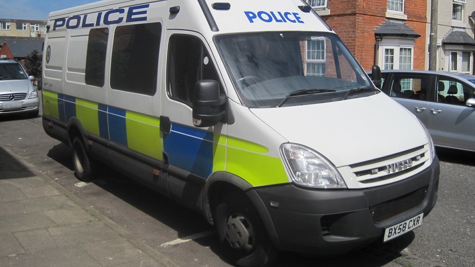 A police van in Birmingham where a young boy was discovered by a member of the public