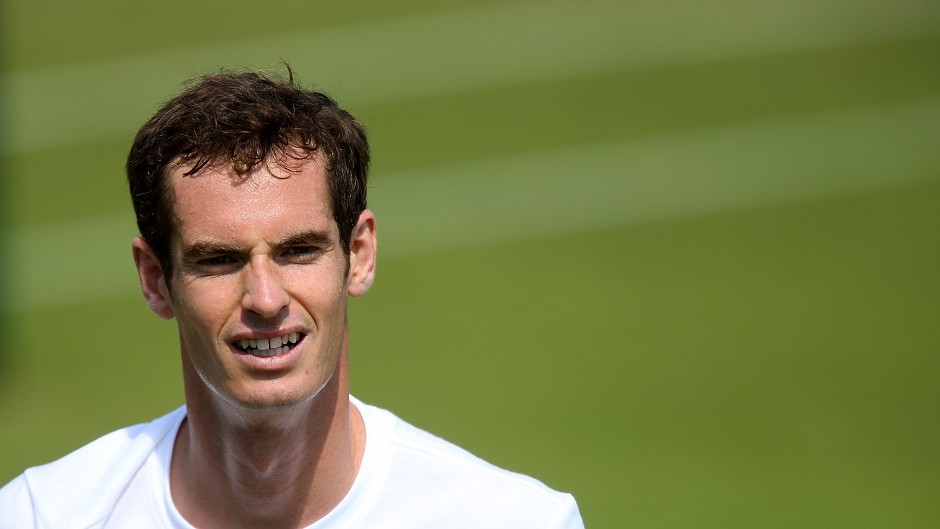 Andy Murray smiles during his practice session at the All England Lawn Tennis and Croquet Club, Wimbledon.