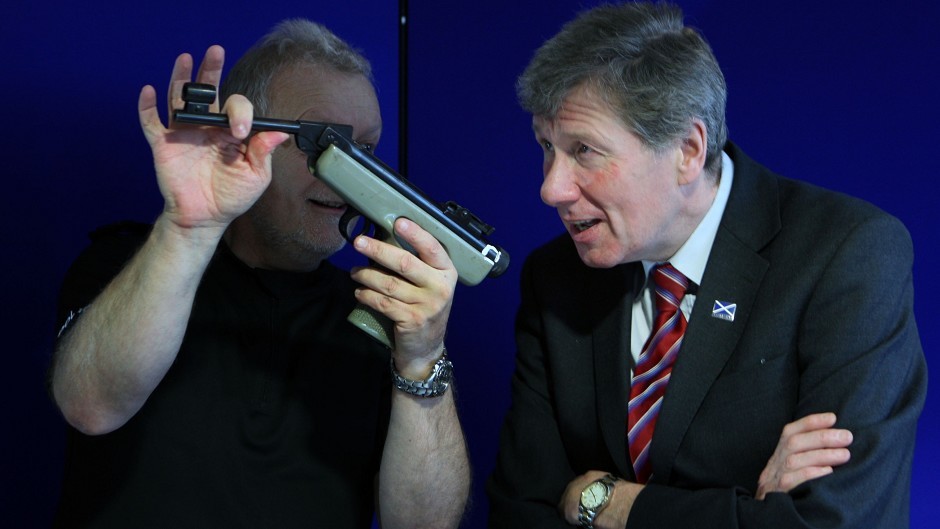 Kenny MacAskill, right, said new laws being passed through parliament will create a 'robust' licensing scheme for air guns