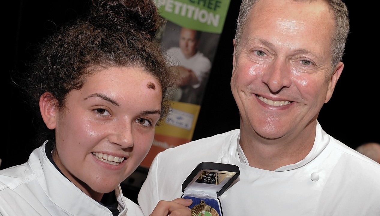 Taste of Grampian at Thainstone Centre, Inverurie. In the picture for aspiring young chef with Nick Nairn is Brogan Tilney.