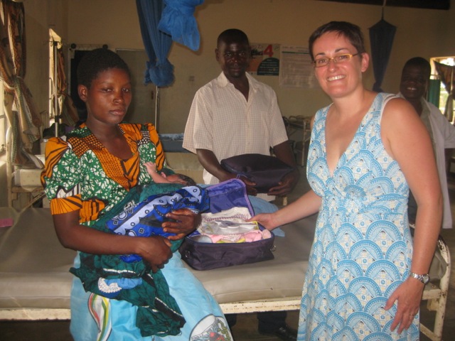 Dr Tracy Morse handing out a new mother kit at Gaga health centre