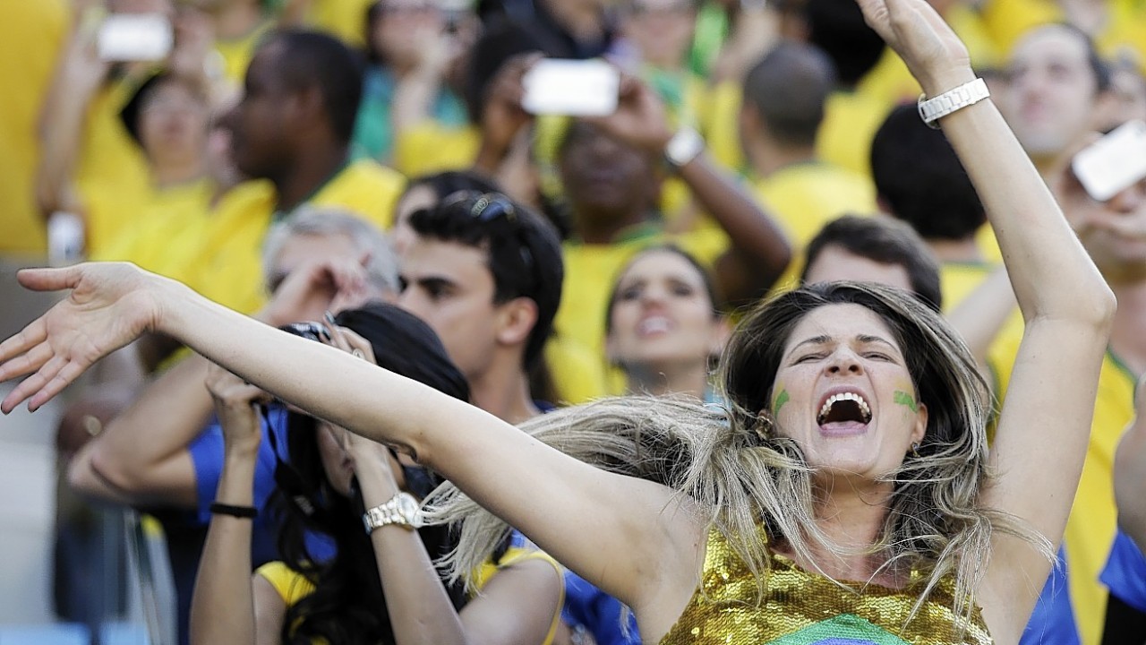 Brazil fans attend the opening ceremony of the World Cup before the group A match between Brazil and Croatia, the opening game of the tournament, in the Itaquerao Stadium in Sao Paulo, Brazil,