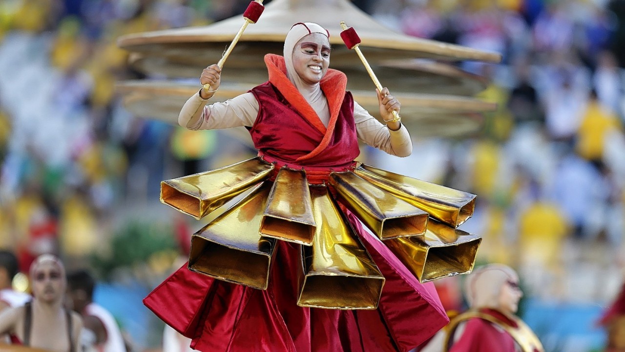 An artist performs during the Opening Ceremony of the 2014 FIFA World Cup Brazil prior to the Group A match between Brazil and Croatia at Arena de Sao Paulo
