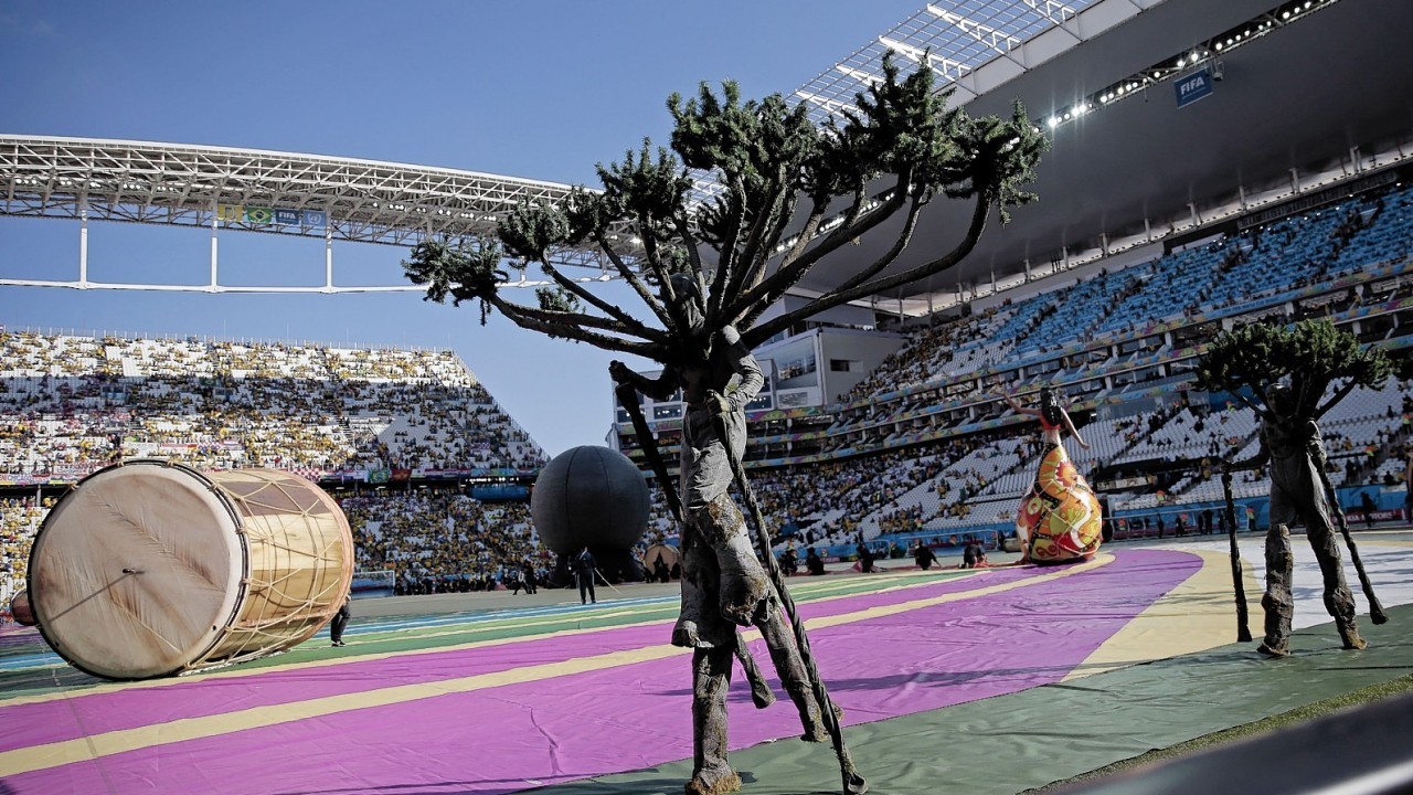 An artist performs during the Opening Ceremony of the 2014 FIFA World Cup Brazil prior to the Group A match between Brazil and Croatia at Arena de Sao Paulo