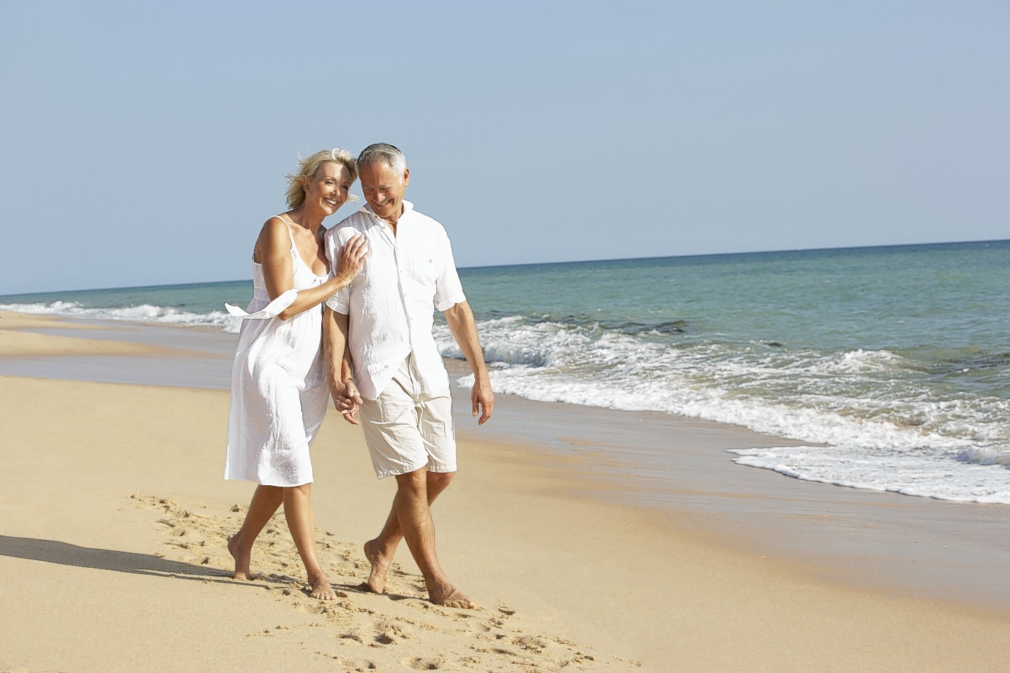 A loved-up couple on the beach