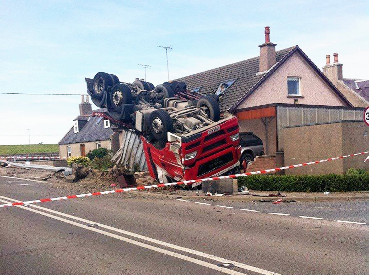 The lorry that overturned at Cortes.