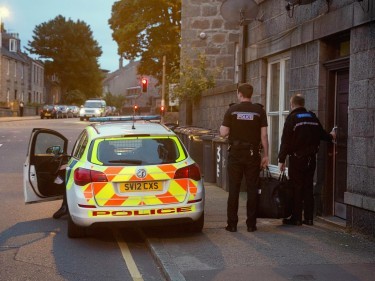 Armed police outside the home in Aberdeen