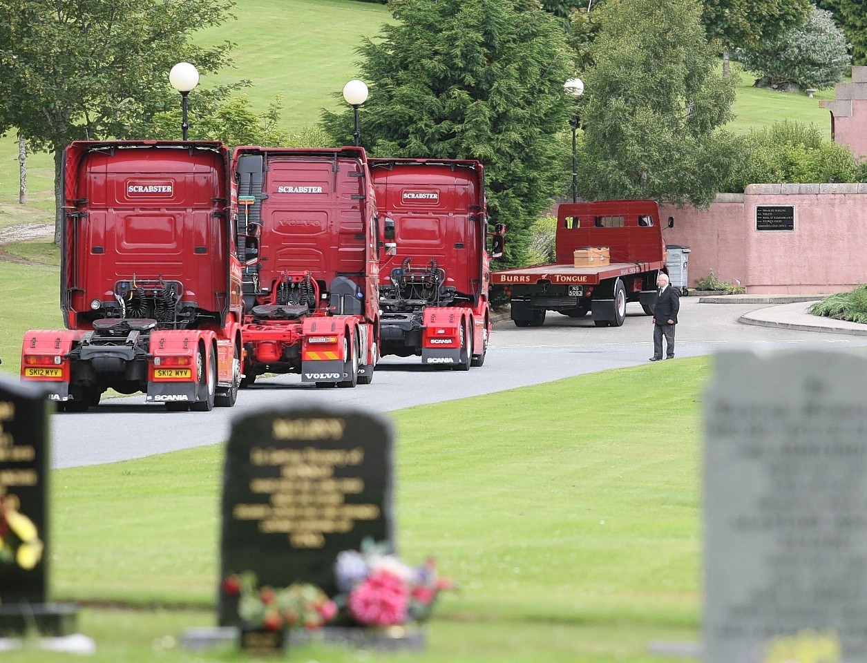 The procession of lorries in memory of Davie Crombie