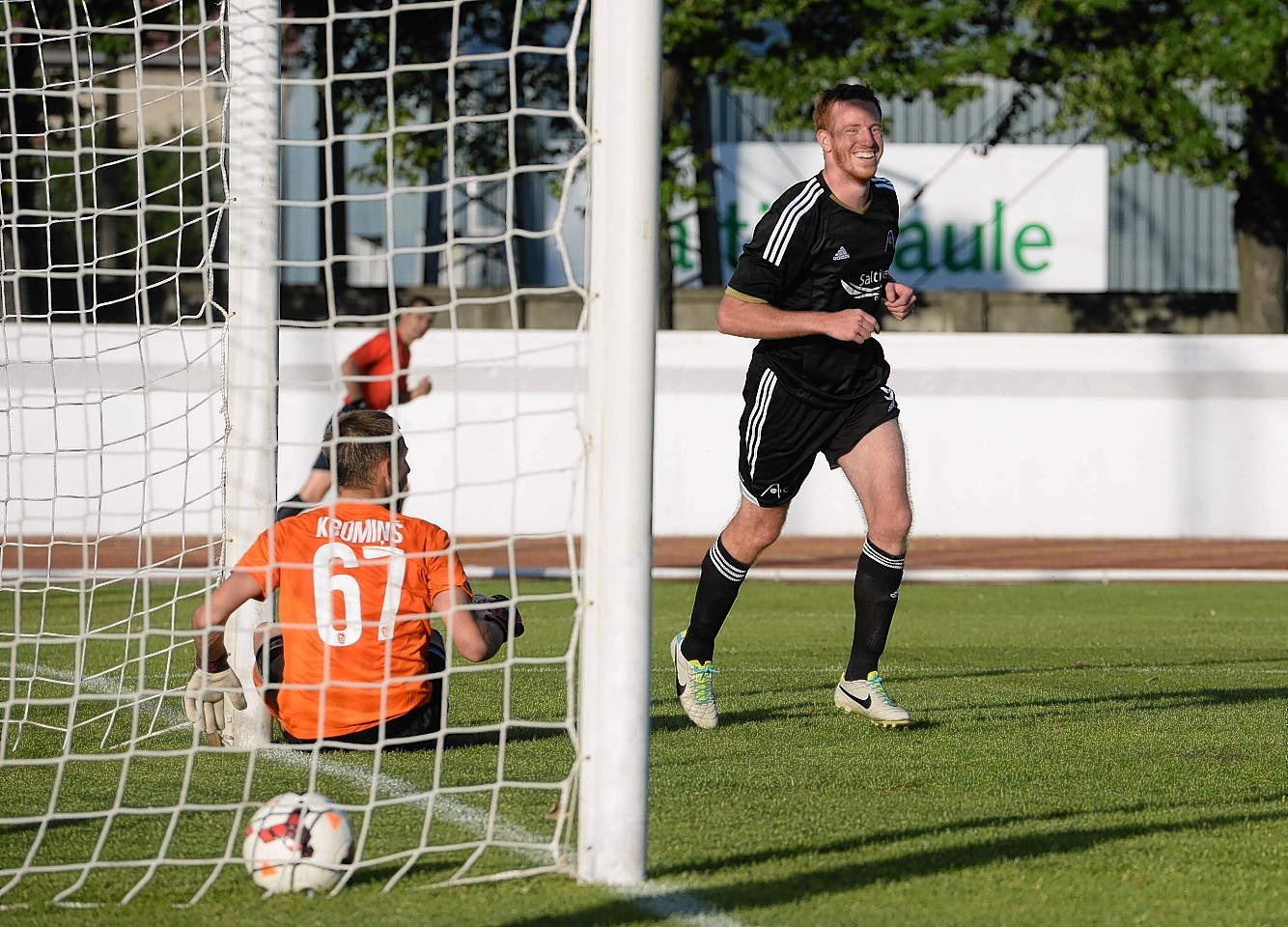 Rooney hit a hat-trick in Riga