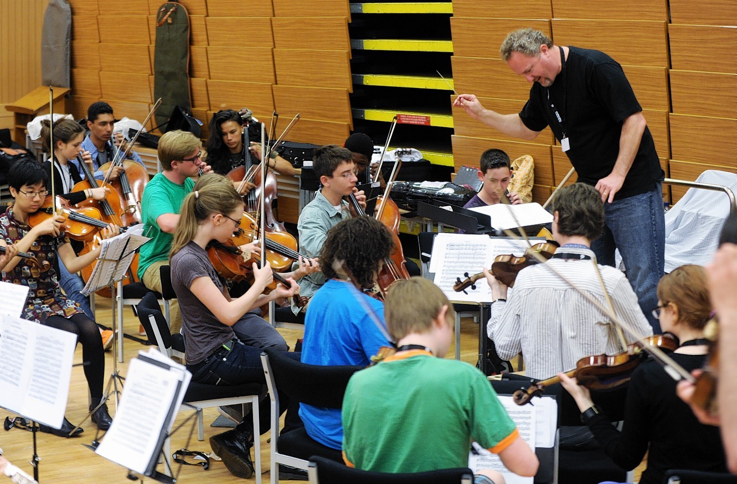 Jeffrey Grogan leads the Youth Orchestra during a rehearsal. Credit: Colin Rennie.