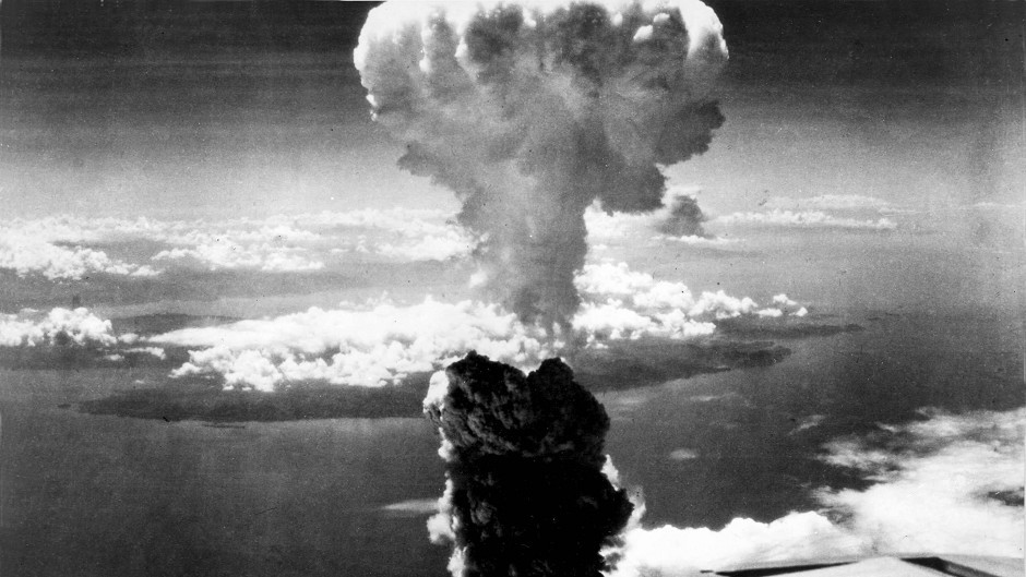 A mushroom cloud towers over Nagasaki, after the atomic bombing on August 9 1945.