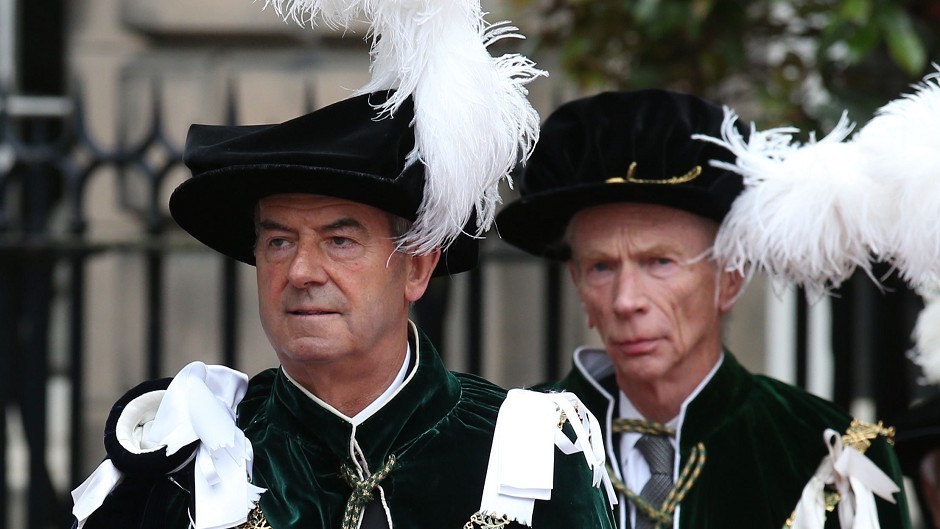 The Earl of Home and Lord Smith of Kelvin, left, attend the Thistle service at St Giles' Cathedral in Edinburgh where they were installed as Knights of the Thistle