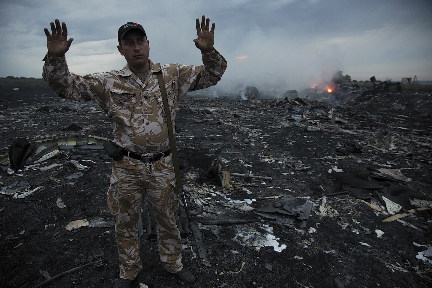 Smoke rises up at a crash site of a passenger plane, near the village of Grabovo, Ukraine (AP)