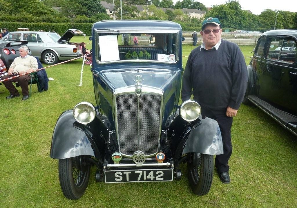 Sandy Mess of  Aberdeen with his 1932 Morris Minor family 8.