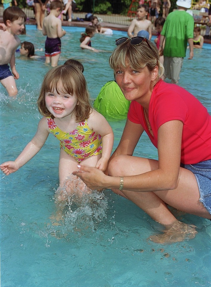 Chelsea Miller and her mum Jacqueline Miller dabble in the pool 
