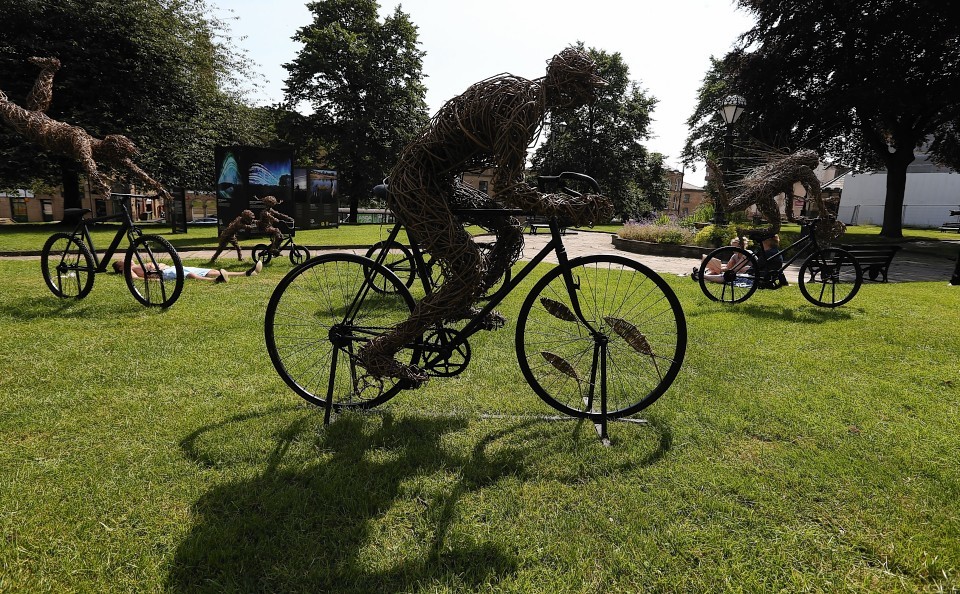 A view of 'La Grande Famille' a life-sized family of cyclists made of willow on steel armatures by the artist Carole Beavis in Huddersfield.