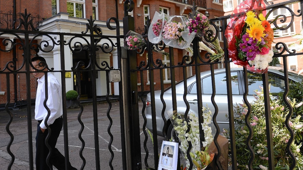 Flowers are laid outside the Dutch Embassy in London, to remember the passengers who were killed on Malaysian Flight MH17 which crashed in Ukraine yesterday as it travelled from Amsterdam to Kuala Lumpur