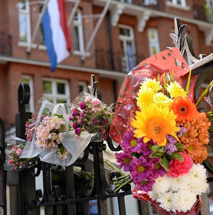 Flowers are laid outside the Dutch Embassy in London, to remember the passengers who were killed on Malaysian Flight MH17 which crashed in Ukraine yesterday as it travelled from Amsterdam to Kuala Lumpur