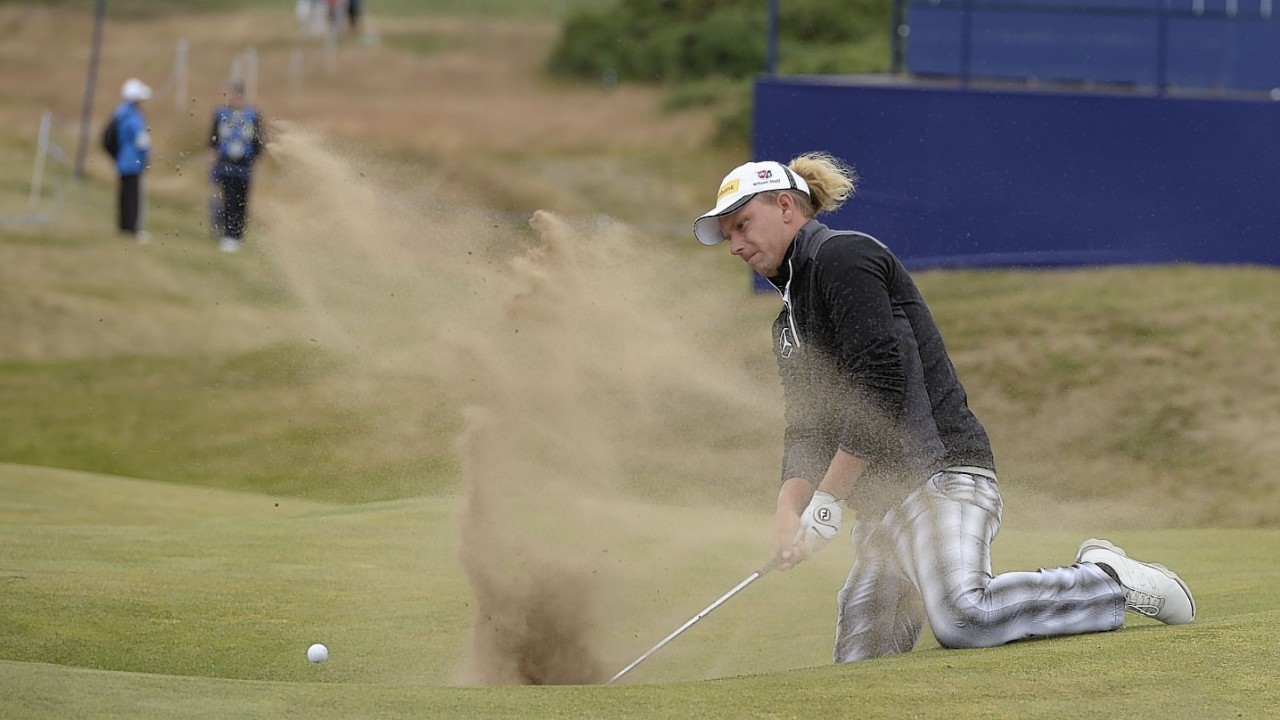 German star Marcel Siem struggles to find his way out of a bunker