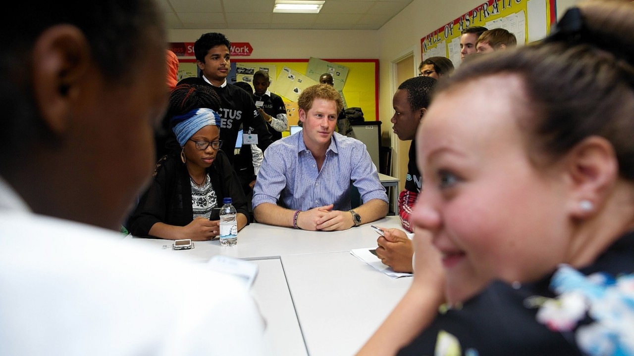 Prince Harry during a visit to Bethnal Green Academy in London, where he joined a group of 60 students from schools across east London who will be receiving training to become digital media champions for the Invictus Games