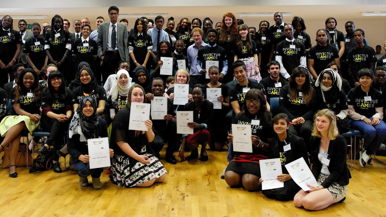 Prince Harry during a visit to Bethnal Green Academy in London, where he joined a group of 60 students from schools across east London who will be receiving training to become digital media champions for the Invictus Games