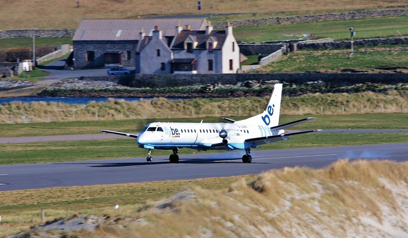 A Flybe/Loganair aircraft landing at Shetland's Sumburgh airport