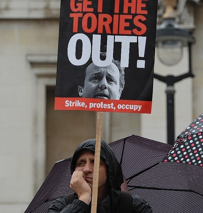 Public sector workers in Trafalgar Square, London, as they take part in the one-day walkout as part of bitter disputes over pay, pensions, jobs and spending cuts.