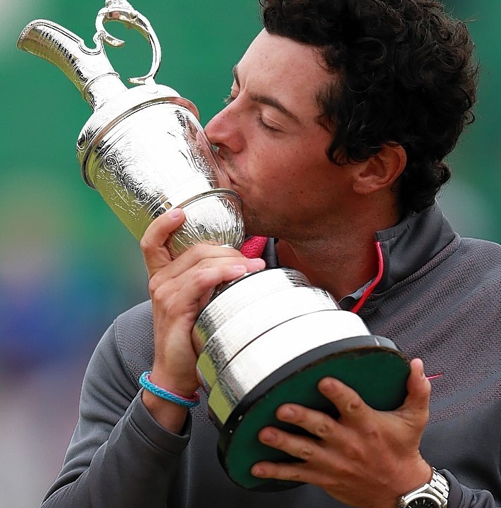 Northern Ireland's Rory McIlroy with the Claret Jug after winning the 2014 Open Championship at Royal Liverpool Golf Club, Hoylake.