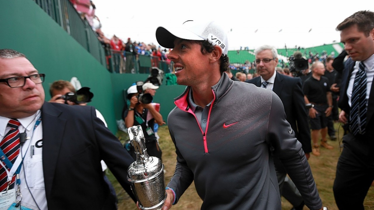 Northern Ireland's Rory McIlroy with the Claret Jug after winning the 2014 Open Championship at Royal Liverpool Golf Club, Hoylake.