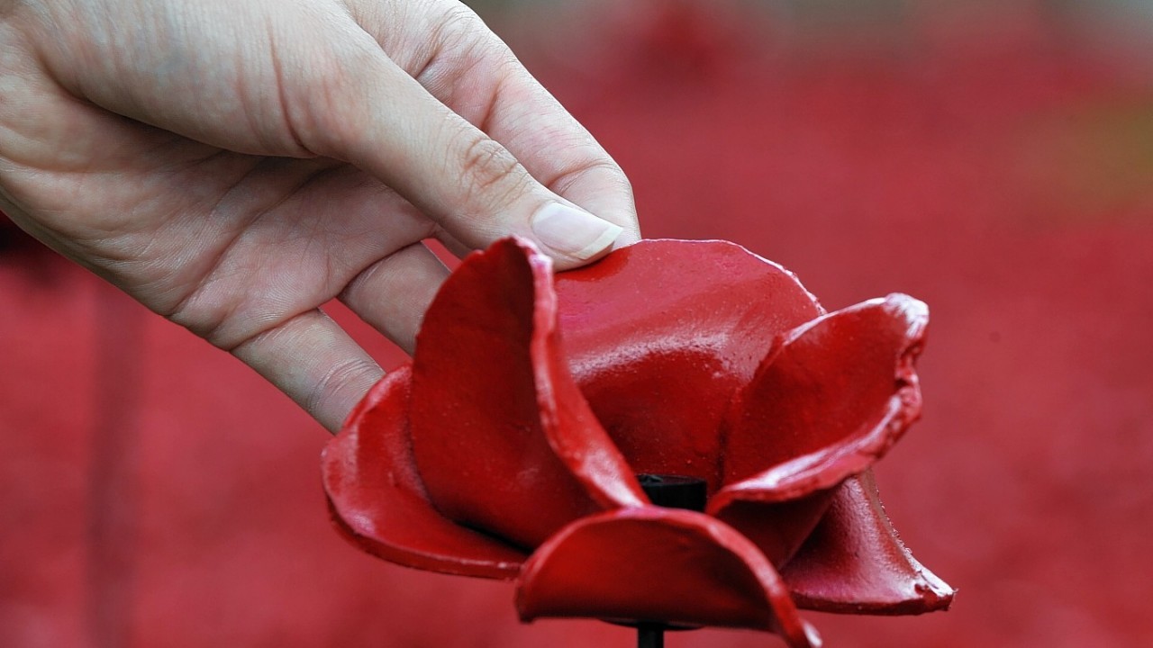 The Poppy Appeal tins have been stolen from shops in Turriff.