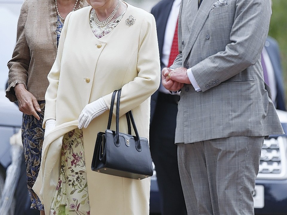Queen Elizabeth II and the Duke of Edinburgh with the Duke of Rothesay during a visit to Dumfries House in Cumnock